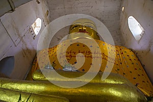 Big Buddha statue in Manuha temple in bagan Myanmar