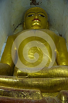 Big Buddha statue in Manuha temple in bagan Myanmar