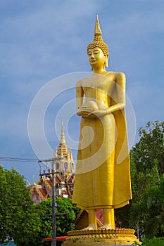 Big buddha statue over scenic blue sky background at Wat Klong r