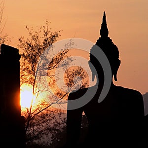 Big buddha statue in sunset thailand