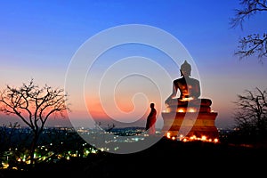 Big Buddha statue Was built on a high hilltop made colourful sky/Big Buddha with the faith of the people