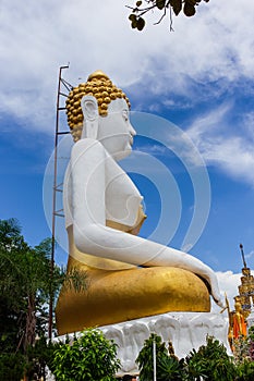 Big Buddha statue in the Wat Phra That Doi Kham temple