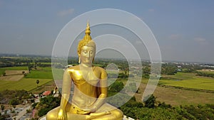 Big Buddha of Thailand, Aerial scene from sky Drone fly slide left