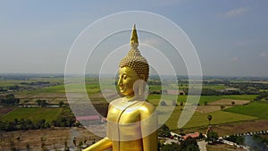 Big Buddha of Thailand, Aerial scene from sky Drone fly zoom