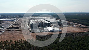 Big Building Construction Site in Nature Area in Europe, Aerial Drone Perspective Wide View