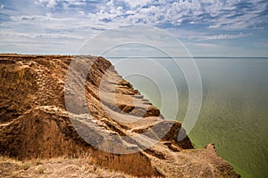 Big cave canyon in the Kherson region on the seashore