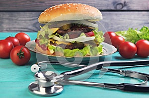Big cheeseburger deluxe and stethoscope