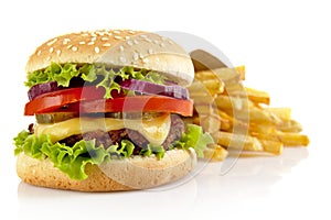 Big cheeseburger with french fries isolated on white background