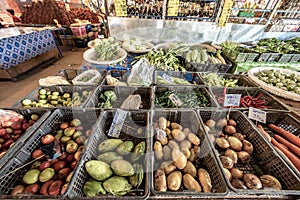 Big choice of fresh fruits and vegetables on market counter