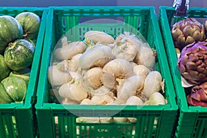 Big choice of fresh fruits and vegetables on market counter