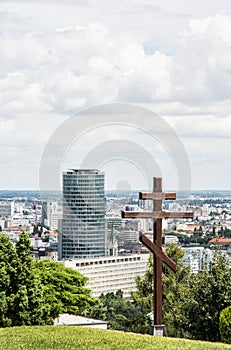 Big christian cross in Slavin and cityscape of Bratislava, Slovakia