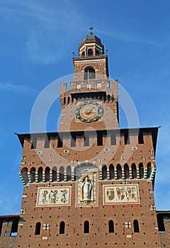 big clock tower of Castle called Castello Sforzesco in Italy