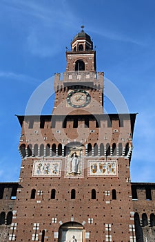 big clock tower of Castle called Castello Sforzesco in Milan