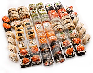 Big colorful sushi set on a white background. Top view.