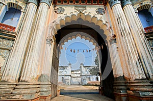 Big columnes of the entrance to historic indian palace