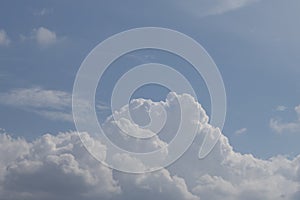 Big combines nimbus clouds on a blue day sky