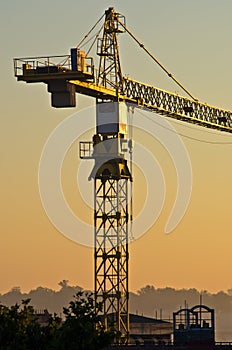 Big construction crane on resiodential construction site