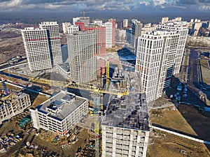 Big construction site with cranes from above