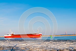 Big container ship entering the port