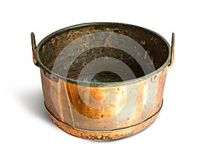 A big copper cauldron isolated on white.