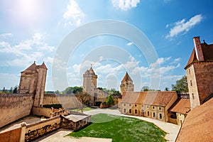 Big court with tower and walls of Blandy-les-Tours castle