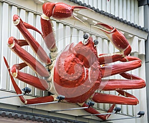 Big Crab Sign show outside Japanese restaurant photo