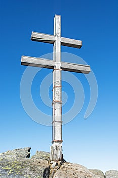 Big cross on the hill Dumbier in Low Tatras mountains, travelling theme