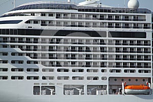 big cruise ship waiting in istanbul port. Close-up of balconies.