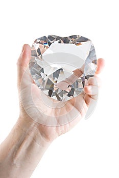 Big crystal heart in men's hand