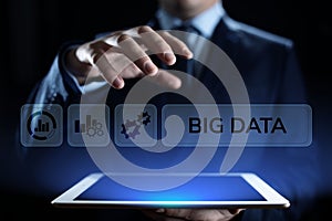 Big data analytics technology internet technology concept. Businessman pressing button on virtual screen.