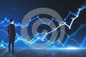 Big data concept with man analyzing data information on digital screen