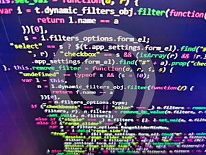 Big data storage and cloud computing representation. Binary computer code background, abstract. Writing programming code on laptop