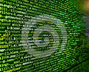Big data storage and cloud computing representation. Screen of web developing code on dark background. Programming code abstract