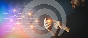 Big data technology background. Using a smartphone against the background of visualization of a computer internet