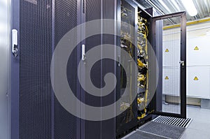 Big datacenter with connected servers and internet cable infrastructure