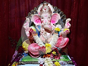 Lord Ganesha clay idol installation at home in Konkan India photo