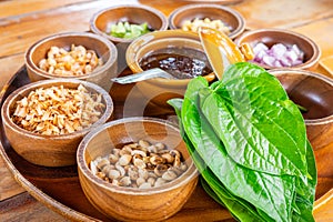 Big dish of plenty in fresh ingredients with betel leaves called Miang Kham