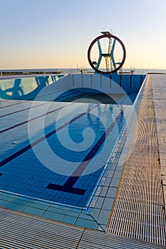 Big Diving board structure and pool in winter