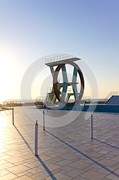 Big Diving board structure and pool in winter