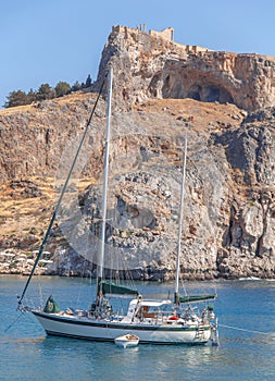 Big docked vintage wooden motor boat at sea Saint Paul bay of Lindos