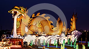 Big dragon statue at night , Supanburi , Thailand