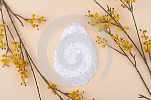 Big egg made of eggshell shards.