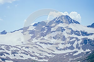 Big Elbrus mountain in summe on cloudy day