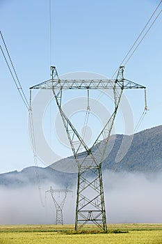 Big electricity high voltage pylon with power lines