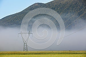 Big electricity high voltage pylon with power lines