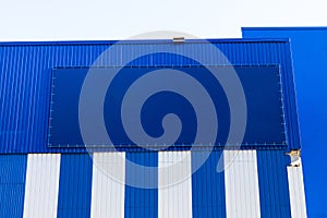 Big empty billboard template on building in city