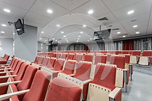 Big empty modern conference hall in luxury hotel. Audience for Speakers at Business convention and Presentation. Photo