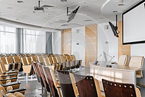 Big empty modern conference hall in luxury hotel. Audience for Speakers at Business convention and Presentation. Photo