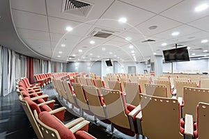 Big empty modern conference hall in luxury hotel. Audience for Speakers at Business convention and Presentation. Photo