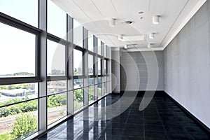 Big empty office space with window wall. Day light illumination.